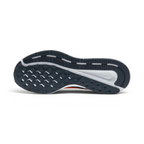 Displays the classic waffle-inspired grid pattern of the dark rubber sole, showcasing the deep flex grooves engineered for unreal everyday walking flexibility and grip.