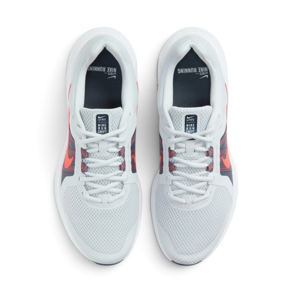 Focuses on the locked-in traditional lacing layout, displaying the perfect symmetry of the grey mesh tongue, the contrast eyelet bands, and the airy mesh guarding the front toe box area.