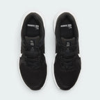 Focuses on the locked-in webbed lace configuration, the structural alignment of the Flywire channels, and the breathable texture of the toe box.