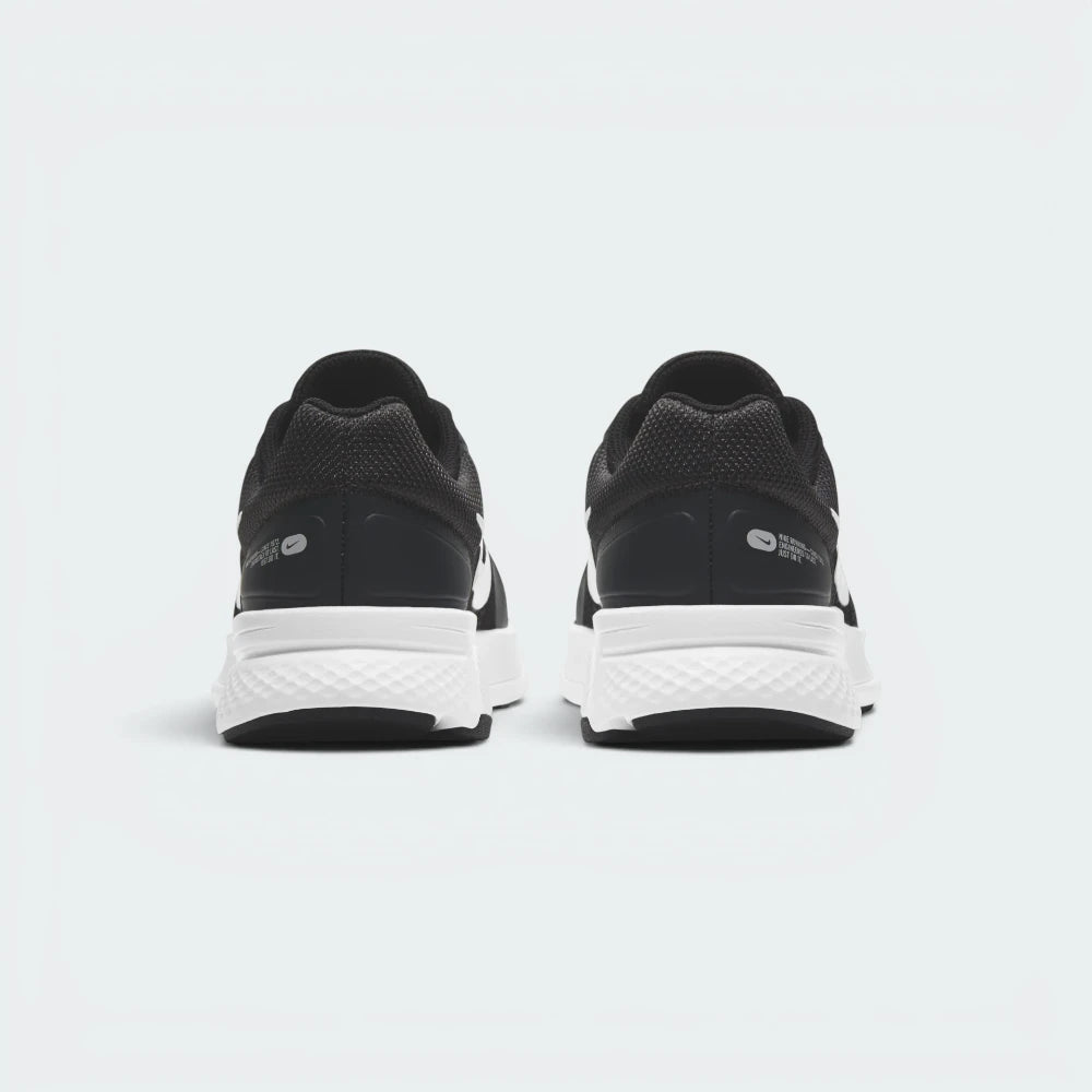 Focuses on the structured mesh heel counter layout and the clean, curved finish of the shock-absorbing foam sole.
