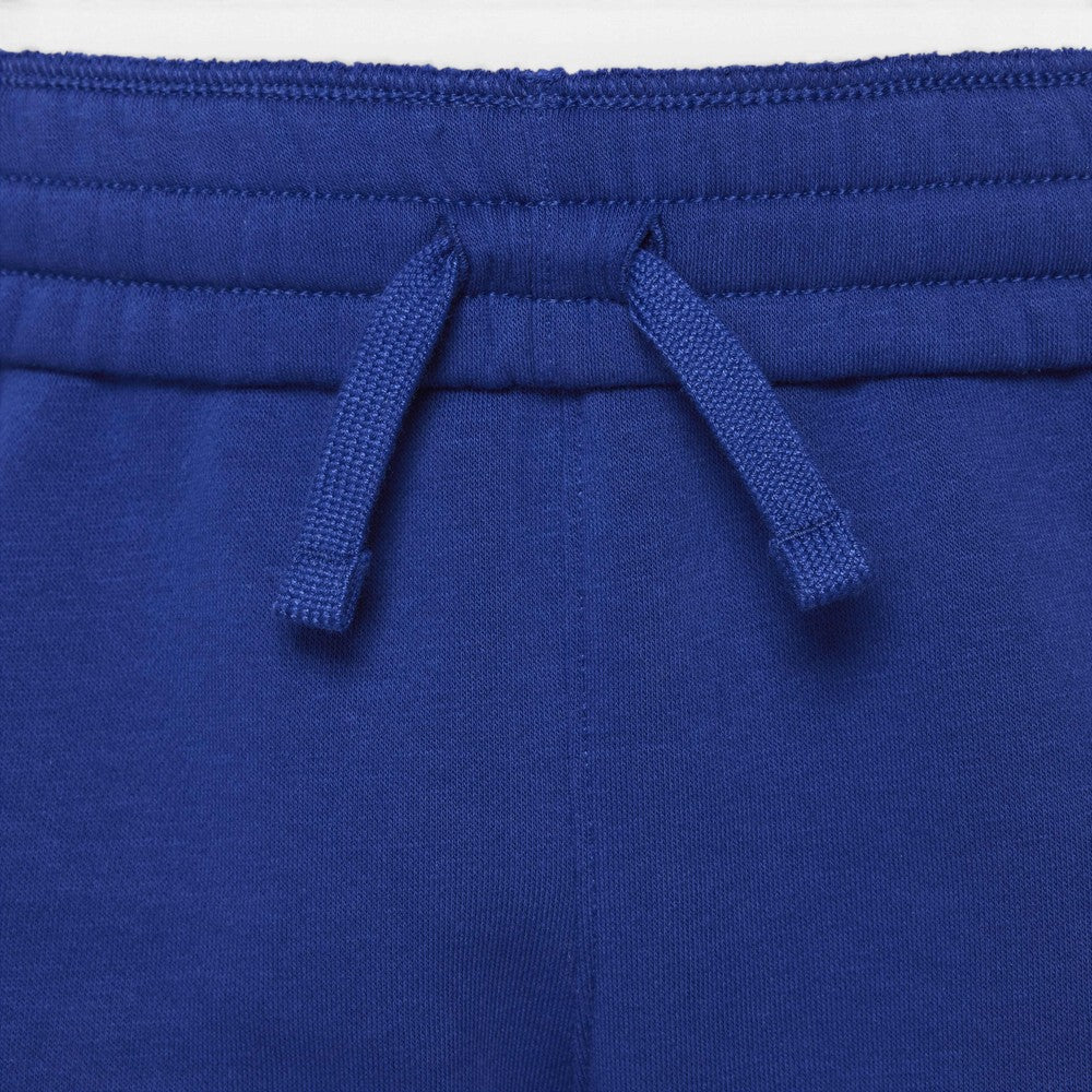 Close-up of the waistband of royal blue sweatpants, showing the elasticized drawstring waist with two matching blue drawstrings.