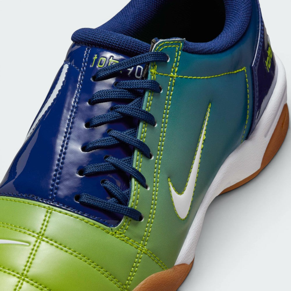 Details the premium precision of the stitched synthetic overlays wrapping the toe cap, showing how cleanly the off-centre laces clear the primary ball-striking area.