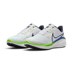 Showcasing the "unreal" clean lines, layered white-to-racer-blue depth, and wide-base midsole geometry from a 45-degree perspective.