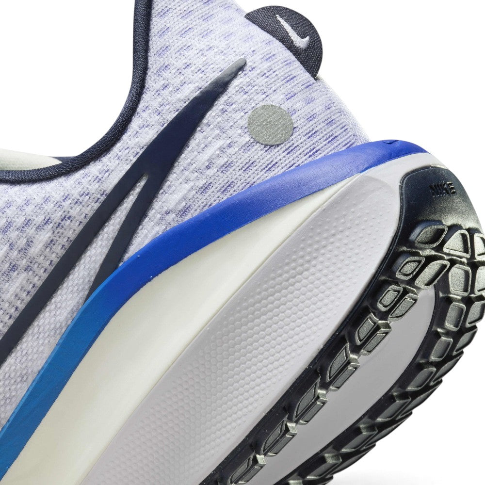 Highlighting the Dual-Density Stacked ZoomX & Cushlon 3.0 Foam Sidewall Texture, Printed Swoosh Accents, and Waffle Break-Point Rubber Tread, demonstrating the impact-absorbing foam depth and road-tested tooling.