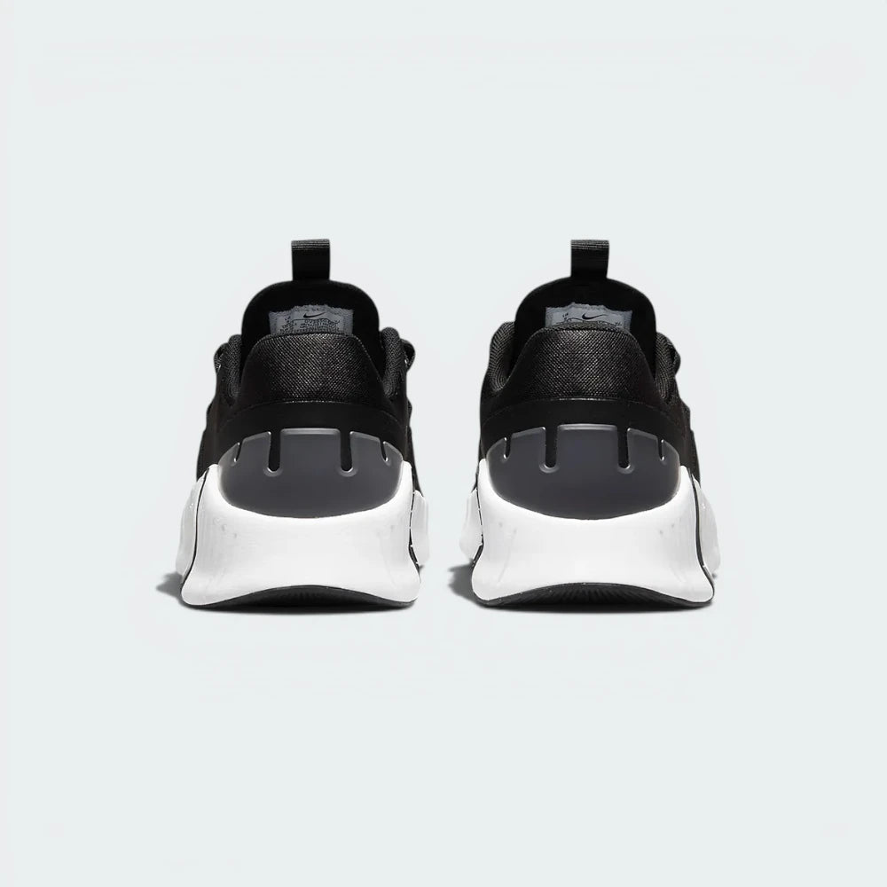 View from Behind Looking at the Heel: Focusing on the wide stability fins and the prominent Nike branding on the heel support.