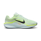 Side profile of the Nike Women's Air Winflo 11 Running Trainer in Barely Green, Black, and Volt showing engineered mesh upper, Cushlon foam midsole, and full-length Nike Air unit.