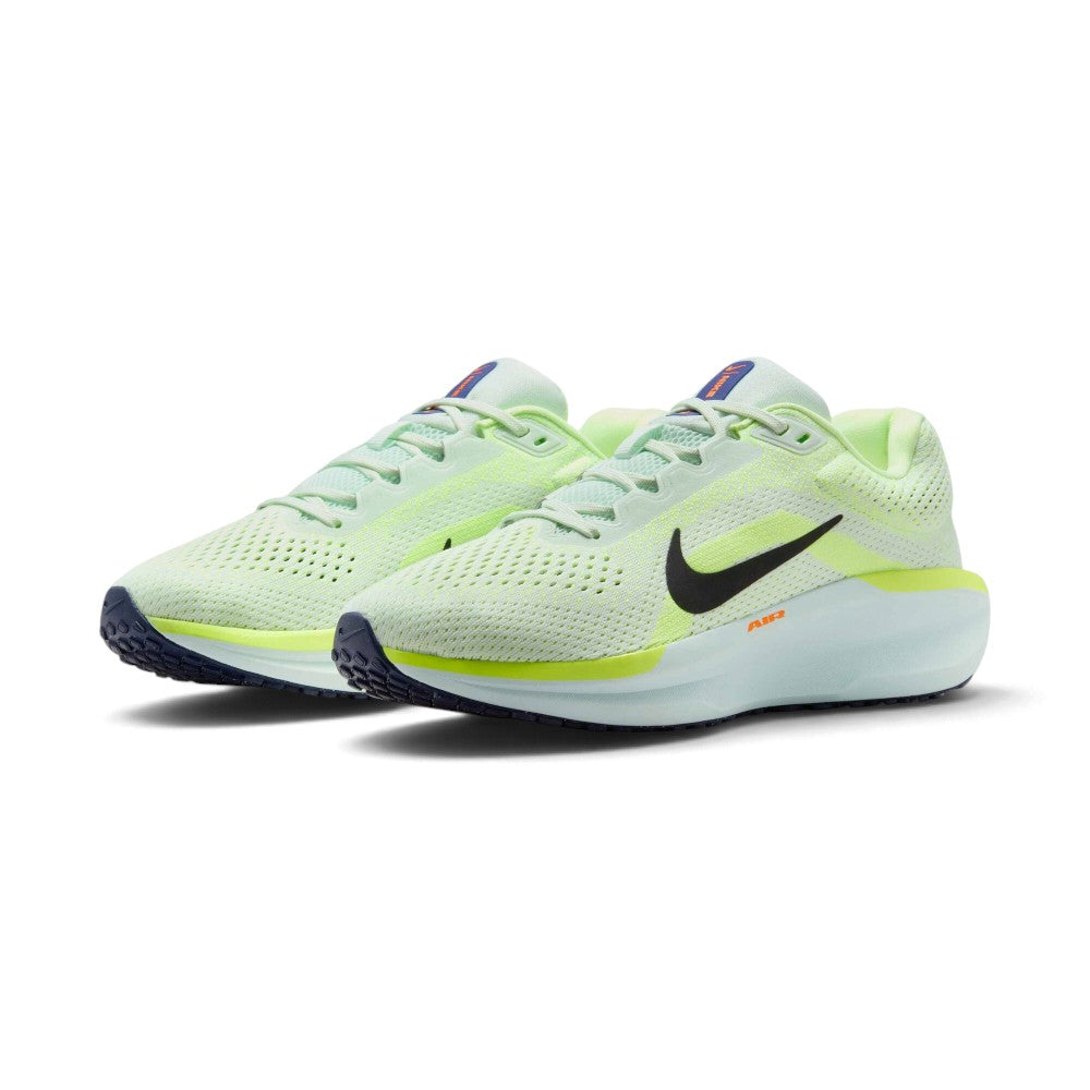 Three-quarter forward angle of the Nike Winflo 11 trainers, showcasing their updated wider heel geometry and vibrant green-and-volt color blocking.