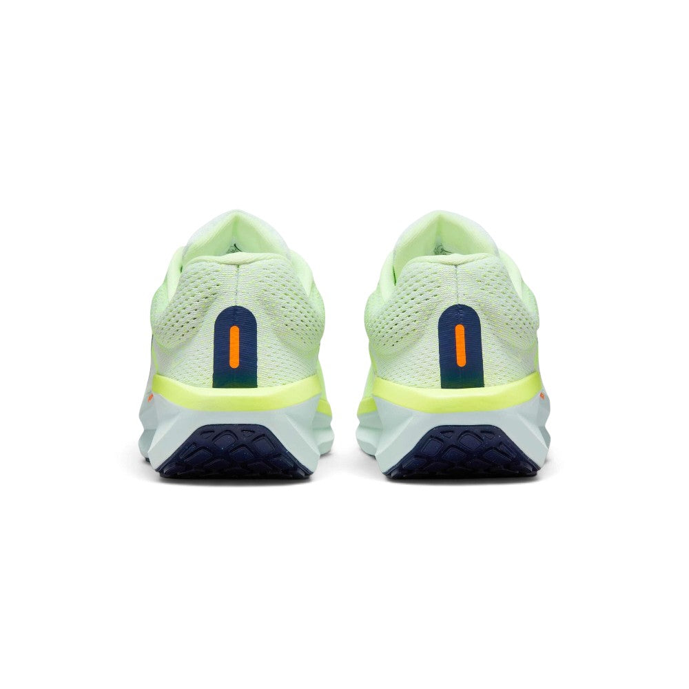 Rear view of the sneakers emphasizing the wider heel stability base, reflective hit details, and the rear ground contact footprint.