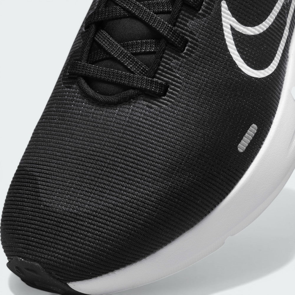 Zoom Looking at the Front of the Shoes and Laces: A close-up of the technical mesh grain and the reinforced black eyelet skins.