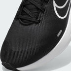 Zoom Looking at the Front of the Shoes and Laces: A close-up of the technical mesh grain and the reinforced black eyelet skins.
