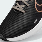 Zoom Looking at the Front of the Shoes and Laces: A close-up of the technical mesh grain and the reinforced dark eyelet skins.
