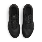 Focuses on the locked-in midfoot fitband and the professional Nike branding on the tongue.