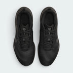 Focuses on the locked-in midfoot fitband and the professional Nike branding on the tongue.