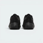 Focuses on the increased foam midsole height and the professional finish of the heel counter.