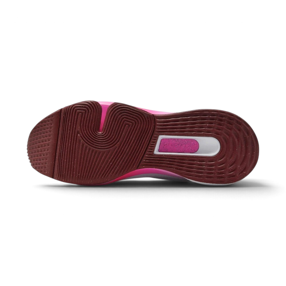Displays the technical horseshoe-shaped flex groove and the multi-directional traction pattern designed for unreal floor grip.