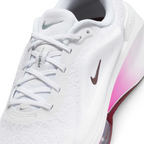 Details the high-definition breathability of the toe box mesh and the precision of the silver branding.