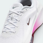 Details the high-definition breathability of the toe box mesh and the precision of the silver branding.