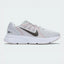 Side Profile Image: The Photon Dust Zoom Span 3, highlighting the Metallic Pewter Swoosh and the chunky, cushioned midsole.
