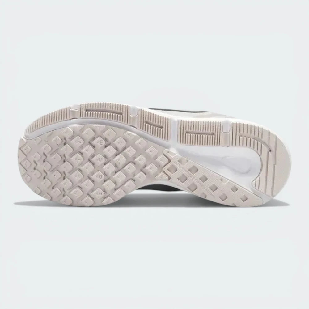 Outsole View: Showing the waffle-inspired traction pattern and the lateral crash rail for smooth transitions.