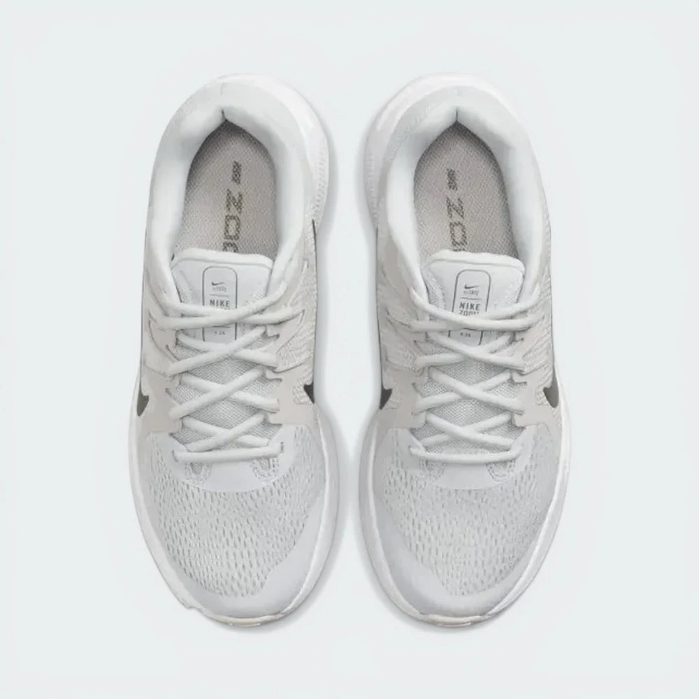 Top-Down View of Pair: Looking down at the grey lacing system and the breathable mesh texture of the toe box.