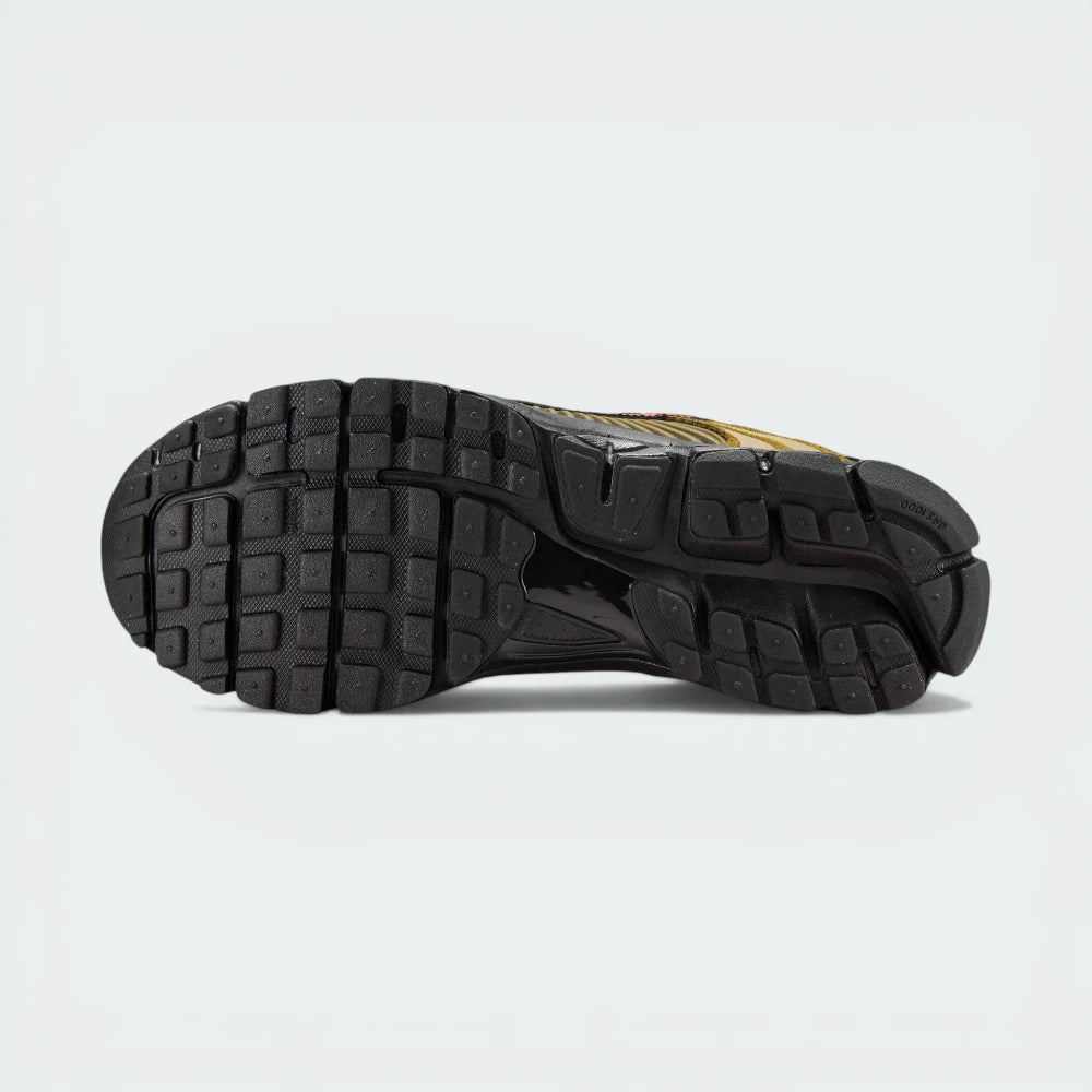 Outsole View: Showing the waffle-inspired traction pattern with high-abrasion rubber zones.