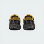 View from Behind Looking at the Heel: Focusing on the ventilated plastic cage and the layered midsole construction.