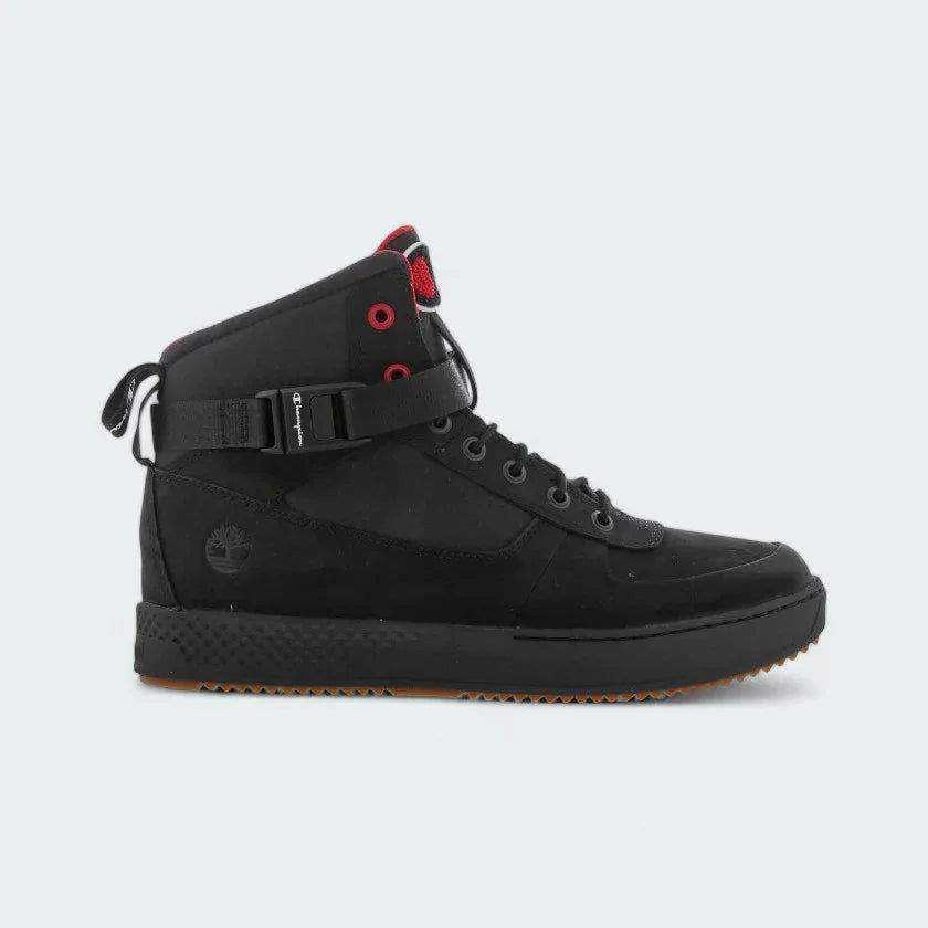Timberland X Champion City Roam boots in black nubuck, side profile showing lace-up design, padded collar, and Timberland tree logo with Champion 'C' branding. Main image