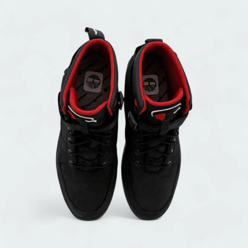 Top-down view of a pair of Timberland X Champion City Roam boots in black, highlighting the texture of the nubuck upper and the lacing system.