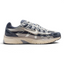 Highlights the high-velocity sweep of the technical overlays, showing the professional, multi-layered texture of the Thunder Blue leather panels resting over the Slate mesh base, and the cream-toned Pale Ivory midsole wall.