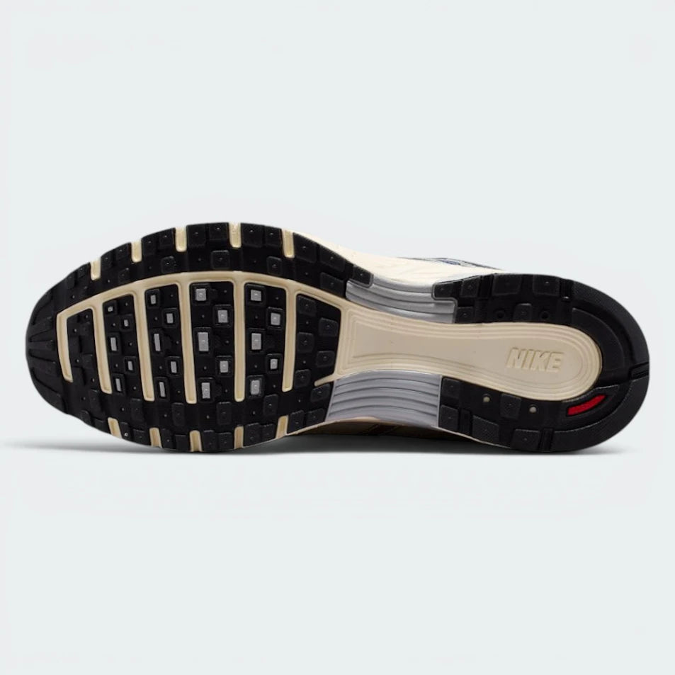 Displays the classic waffle traction pattern of the hard-wearing black rubber sole, showcasing the segmented flex grooves engineered for unreal everyday walking flexibility and grip.