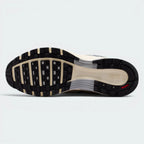 Displays the classic waffle traction pattern of the hard-wearing black rubber sole, showcasing the segmented flex grooves engineered for unreal everyday walking flexibility and grip.