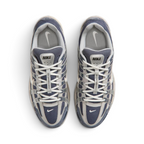 Focuses on the locked-in traditional lacing layout, displaying the perfect symmetry of the navy mesh tongue, the vertical structural lace bands, and the breathable mesh paneling guarding the front toe box area.