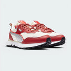 Emphasising the locked-in low-top silhouette and the professional "Ivory Glow" colour accents.