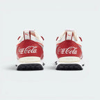 Focuses on the Coca-Cola branding and the professional finish of the multi-layered heel structure.