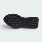 Displays the technical lugged Rider tread designed for unreal vintage-inspired grip.