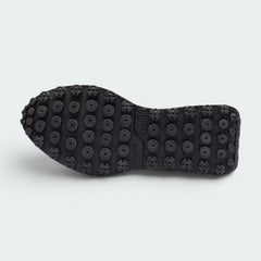 Displays the technical lugged Rider tread designed for unreal vintage-inspired grip.