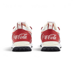 Focuses on the Coca-Cola branding and the professional finish of the multi-layered heel structure.