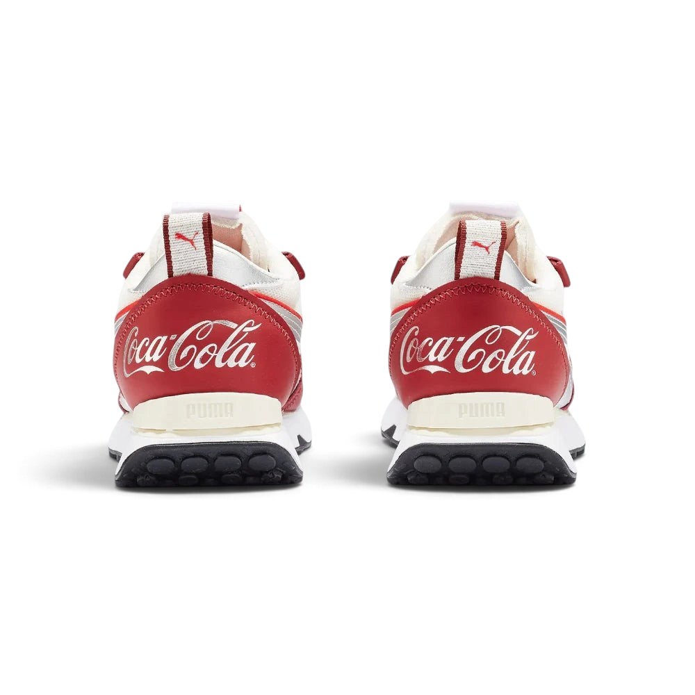 Focuses on the Coca-Cola branding and the professional finish of the multi-layered heel structure.