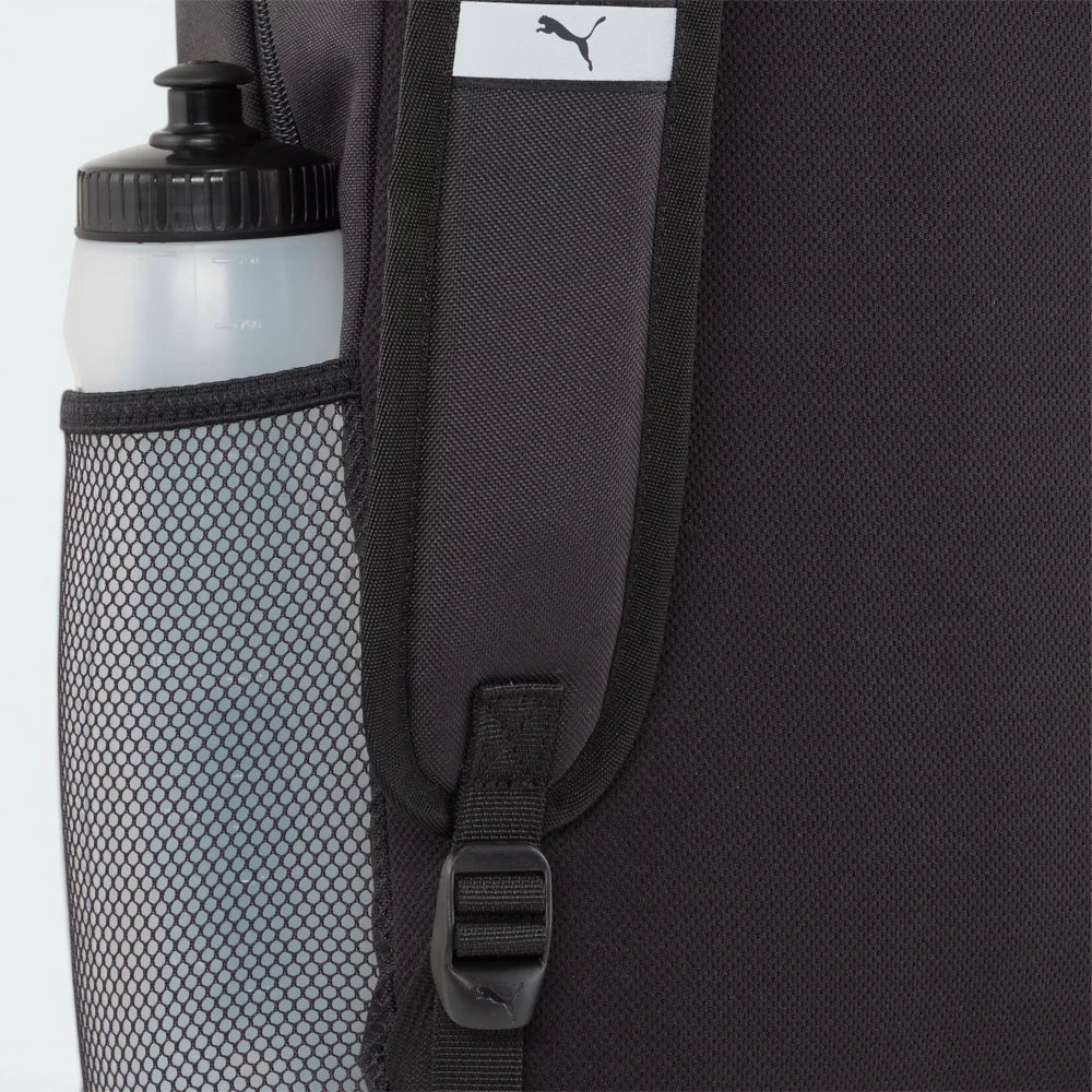 Highlights the high-velocity side mesh pocket and the professional depth of the backpack.