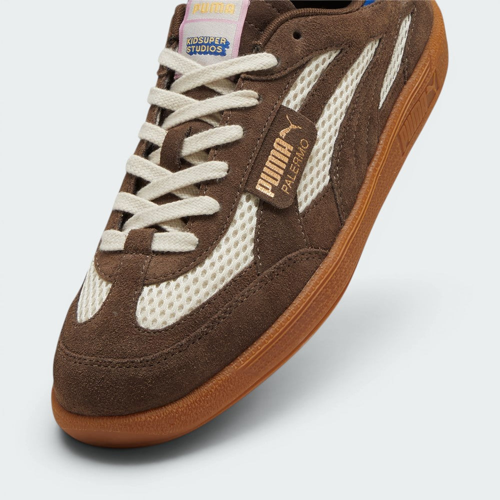 Details the high-definition suede grain and the precision of the leather overlays.