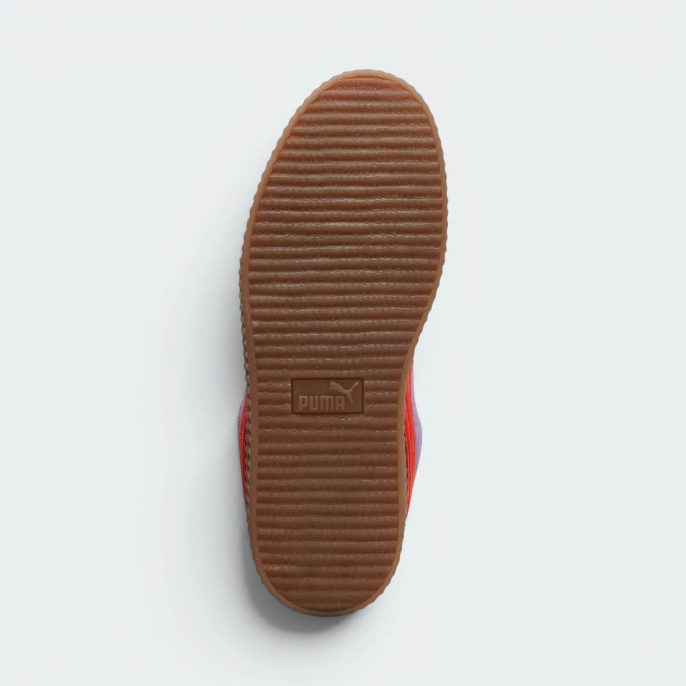 Displays the technical ribbed gum rubber designed for unreal multi-surface traction.