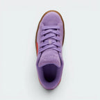 Focuses on the locked-in oversized laces and the professional finish of the padded "Lavender Alert" tongue.