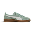 Medial perspective highlighting the inner profile of the shoe, featuring the Green Moon suede quarter with ventilation perforations, white tumbled leather Formstrip, reinforced heel wrap, and smooth gum rubber sidewall.