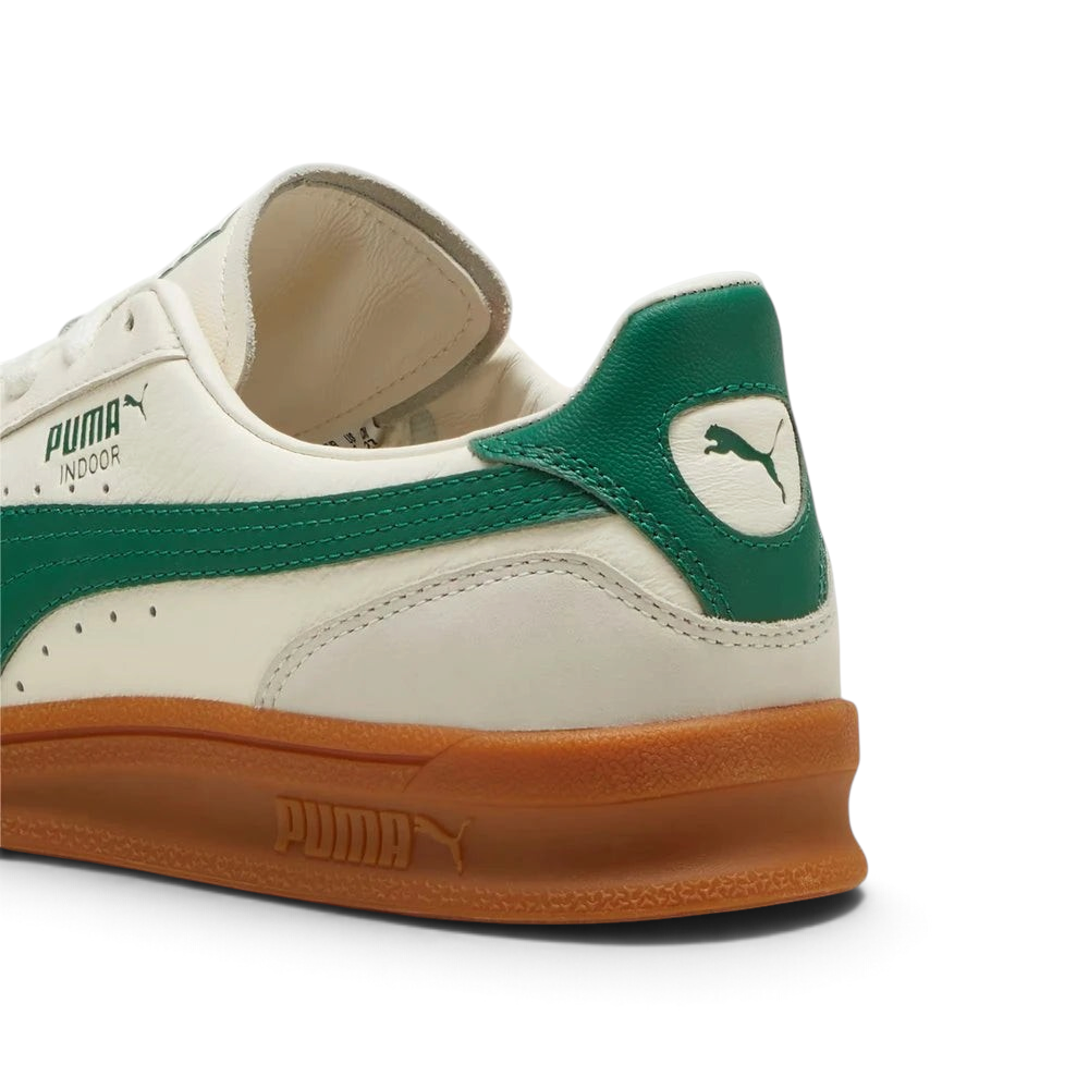 Focuses on the PUMA Cat leather heel window and the professional finish of the nubuck patches.