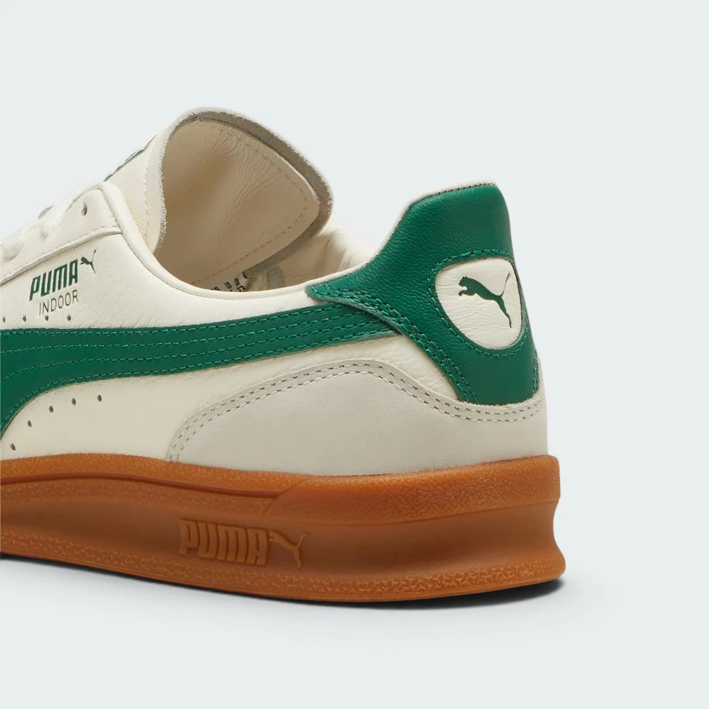 Focuses on the PUMA Cat leather heel window and the professional finish of the nubuck patches.