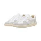 Forward three-quarter angle showcasing both shoes side by side, highlighting the sleek low-profile terrace silhouette, flat white laces, suede mudguards, and clean neutral tone balance.