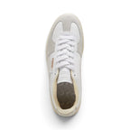 Direct overhead look at the shoe, displaying the Cool Light Gray suede T-toe mudguard, smooth white leather vamp, flat white laces, embossed white leather tongue, and patterned brown cushioned footbed.