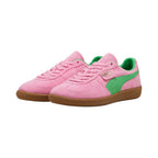 Forward three-quarter angle showcasing both shoes, highlighting the low-slung archival terrace stance, tonal pink flat laces, suede T-toe mudguards, and semi-translucent gum rubber cupsole.