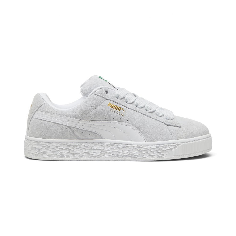 Lateral view showing the soft Silver Mist grey full suede upper, crisp White smooth leather Formstrip, gilded metallic "PUMA SUEDE XL" lateral script, amplified textured white rubber cupsole sidewalls, and chunky padded collar line.