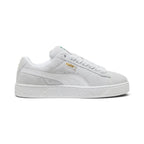 Lateral view showing the soft Silver Mist grey full suede upper, crisp White smooth leather Formstrip, gilded metallic "PUMA SUEDE XL" lateral script, amplified textured white rubber cupsole sidewalls, and chunky padded collar line.